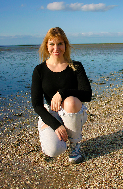 Laura Meier on the beach sunny afternoon